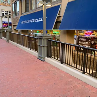 the entrance to the metro market