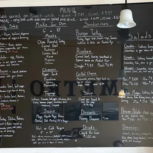 Menu on April 25, 2023. Fantastic lineup of Sandwiches and Salads. Reuben Sandwich came with a bag of chips.