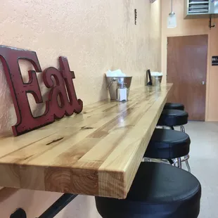 You can sit at the bar and enjoy a salad or a sub.