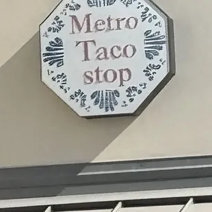 Diminutive sign, we almost passed the eatery.