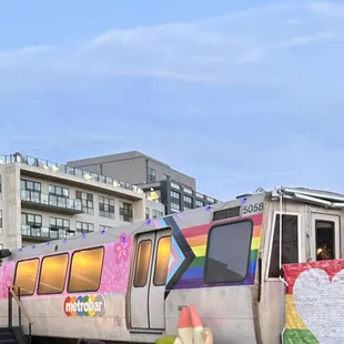 a colorful train on the tracks