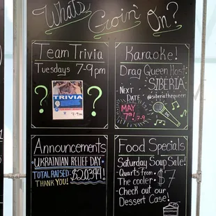 a blackboard with a list of events