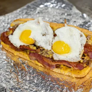 two fried eggs on a toasted bread