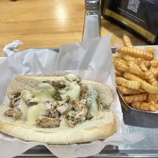 Chicken cheesesteak and fries