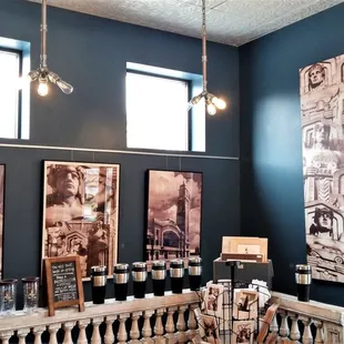 Art deco prints behind the front counter and in the food and beverage preparation area (2019)