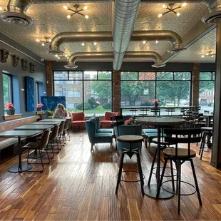 tables and chairs in a coffee shop