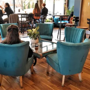 On this visit, someone is sitting in the funky chairs (2023)
