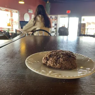 a half eaten cookie on a plate
