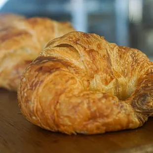 two croissants on a table