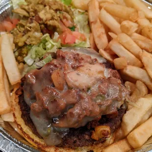 Pastor Burger. Burger patty topped with pastor pork, pepper jack, pineapple, lettuce, pico, fried jalapeno, fries. $11.50.