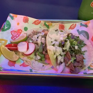 Cecina is the taco on the left!!  Both tacos were Good stuff. I don't recall what the other meat was!