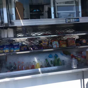 a man standing in front of a food truck