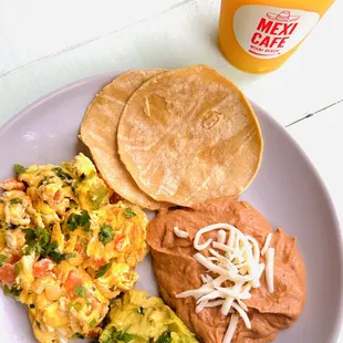 a plate of food and a drink