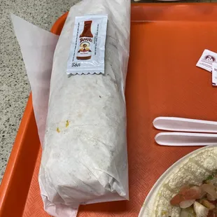 Choncho Burrito with packet for scale