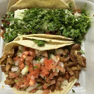 Chorizo Taco on the top and Adobada Taco on the bottom