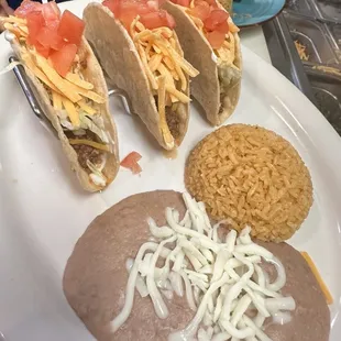 Hard shell tacos lunch special with rice and beans