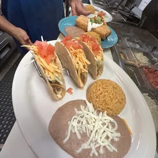 Hard shell tacos lunch special with rice and beans