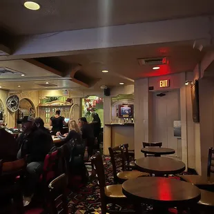 Seating in the bar area, seems to be a spacious restaurant