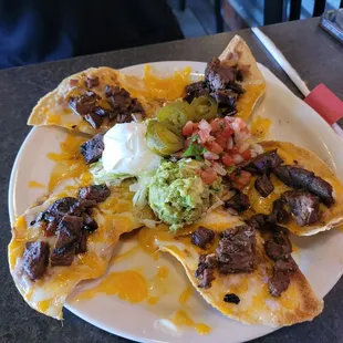Lunch nachos with steak