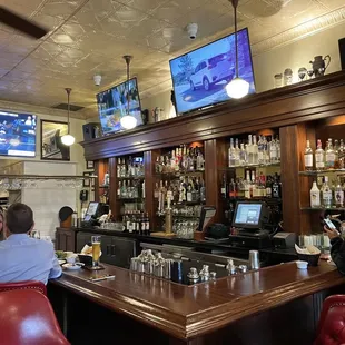 people sitting at the bar