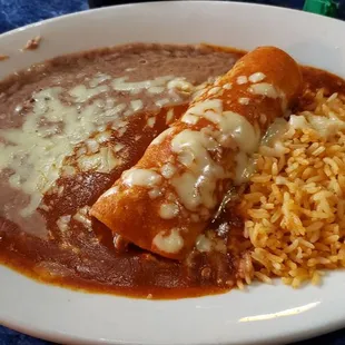 Chicken Enchilada with rice and beans - lunch special Enchilada, Rice &amp; Beans