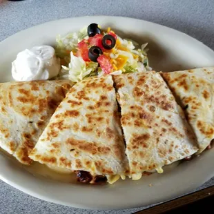 My son and daughter ordered the Chicken quesadilla. Lunch serving was large. Well worth it.  #socialbuzzme