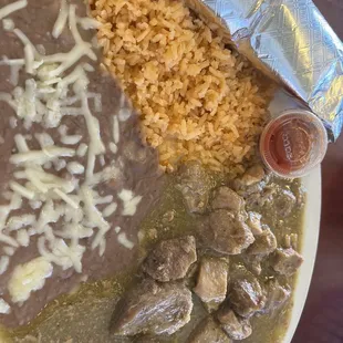 a plate of food with rice and beans