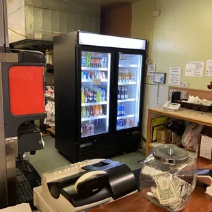 a cash counter with a vending machine