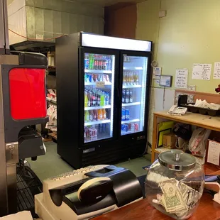 a cash counter with a vending machine