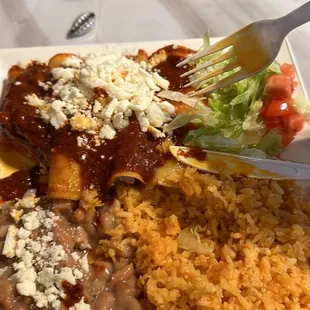 a plate of beans, rice, and beans