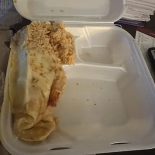 How food looked when opened up container of cheese enchiladas rice n beans