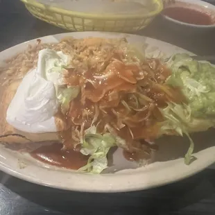 Chimichanga (with shrimp instead of chicken), rice, beans, sour cream, and guacamole
