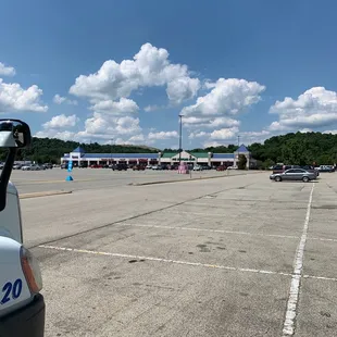 a parking lot with cars parked in it
