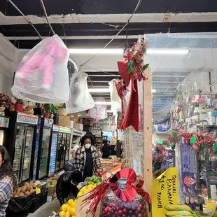 a fruit stand in a grocery store