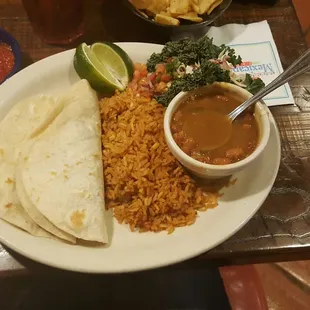 Brisket tacos. They need a little extra luckly we had ordered queso to add