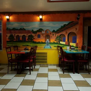 a colorful mural on the wall