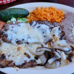 Carne asada.. doesn't normally come with cheese