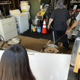Oil fryers in the garage