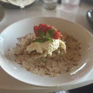 Slice of Coconut & Golden Raisin Tres Leches Cake