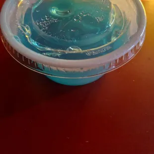 a bowl of blue liquid