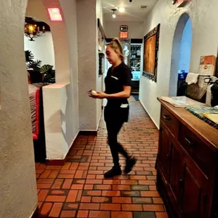 Staff inside restaurant.