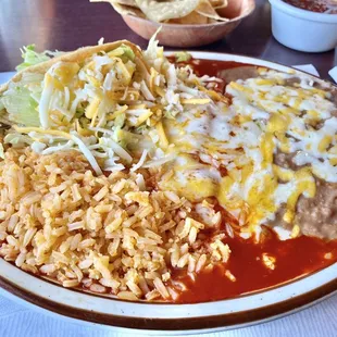 Lunch 2 item combination plate with a cheese enchilada and shredded roast beef taco