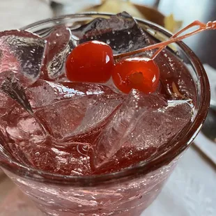 a cherry drink with ice and cherries