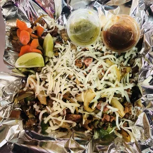 Mix steak Alambres....        steak beacon chorizo  Lots of cheese and lots of other ingredients.simply delicious from Mexico City