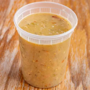 a plastic cup of soup
