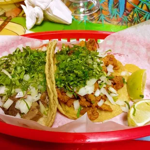 Lengua taco (left) pastor taco (right)