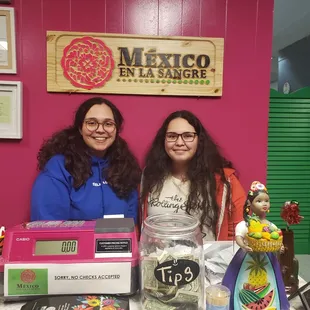 My sister and I behind the counter. Photo creds go to the restaurant owner!