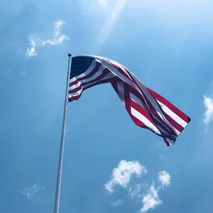 Large US Flag flying over this restaurant.