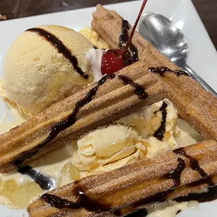 Churro with vanilla ice cream