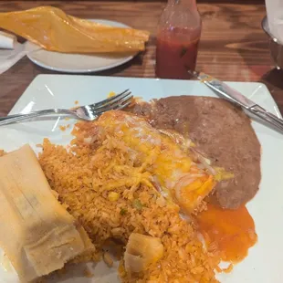 Fresh made tamale and look at the veggie detail in the rice. Tasty